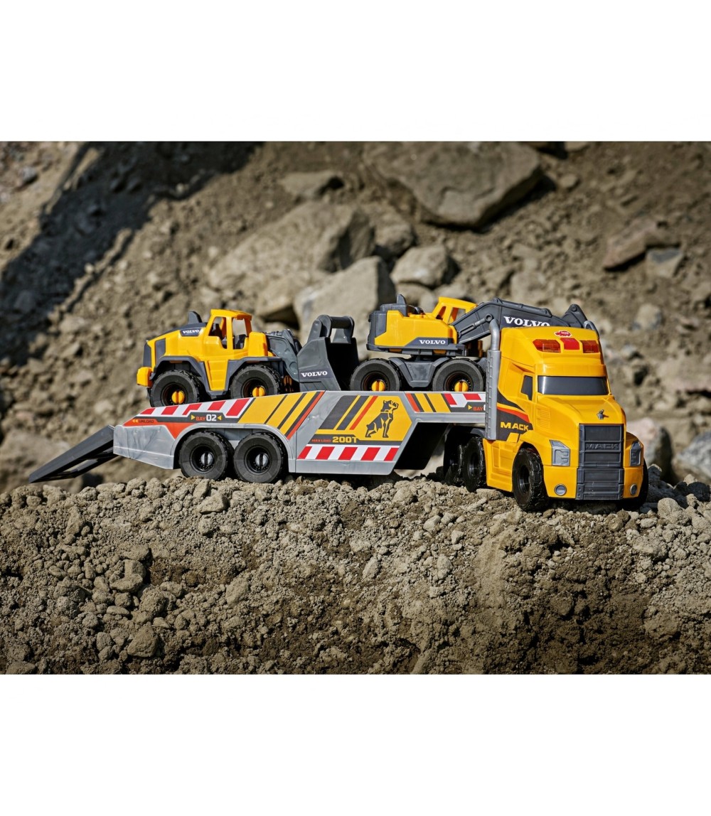 Schwertransporter Mack Heavy Loader Truck mit 2 Volvo Baustellenfahrze